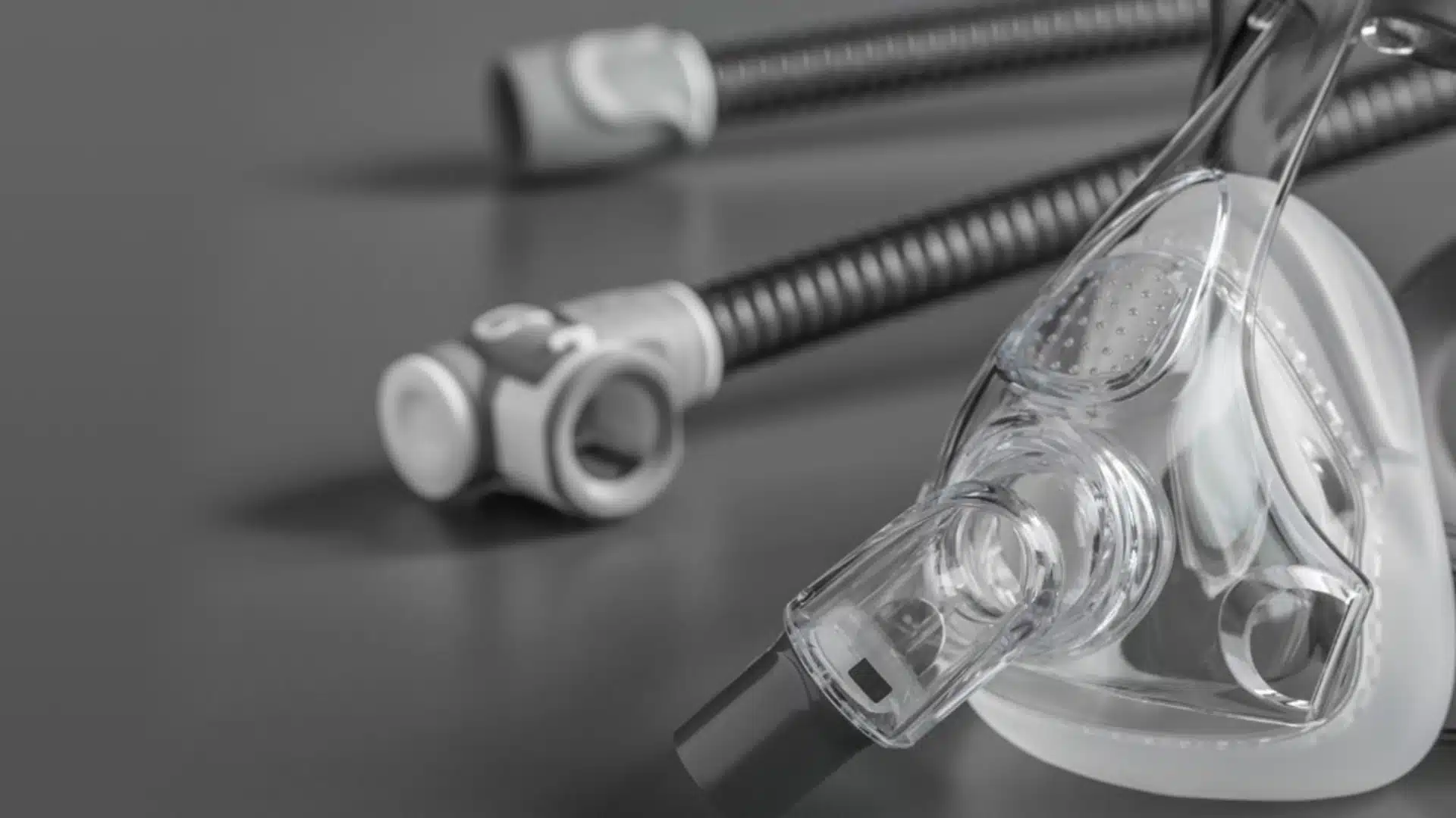 Health Hub 60 Close-up of CPAP mask and hose on gray background